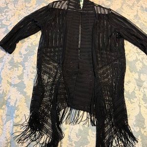 Travelers Chico’s black fringe coverup or Wrap.